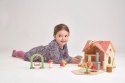 Tender Leaf Toys - Przenośny domek z wyposażeniem i laleczkami