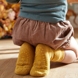 GoBabyGo - Skarpetki antypoślizgowe do nauki chodzenia 6-12 m Mustard